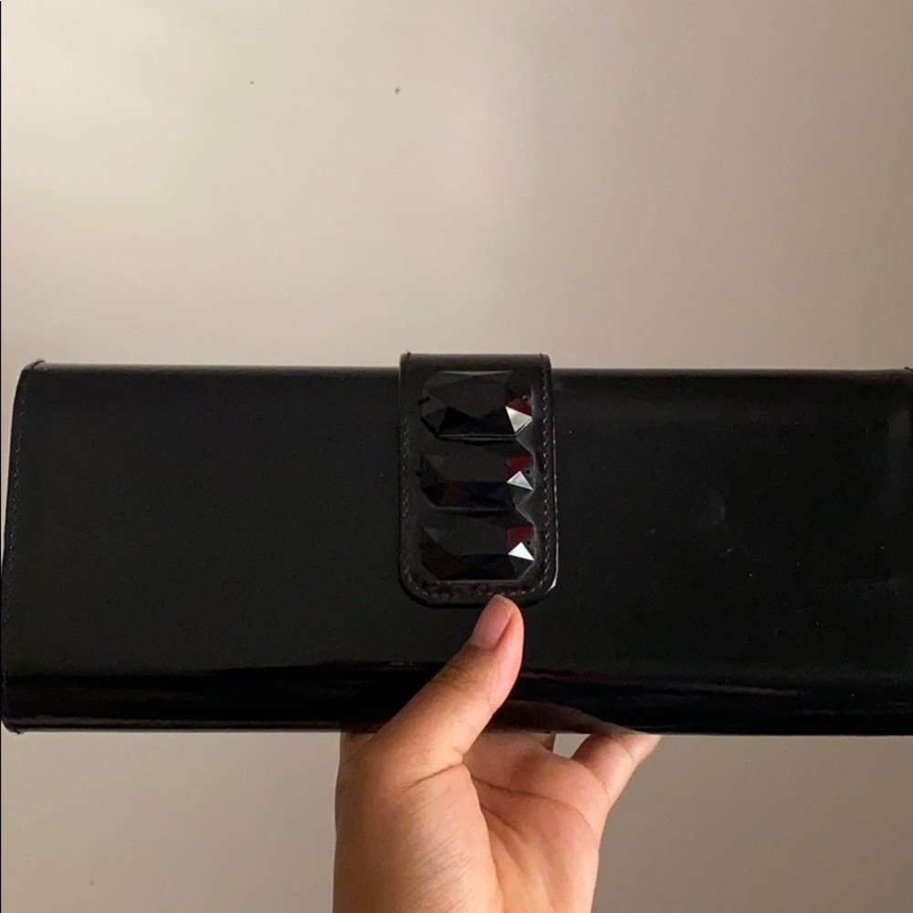 Red interior Lancôme clutch